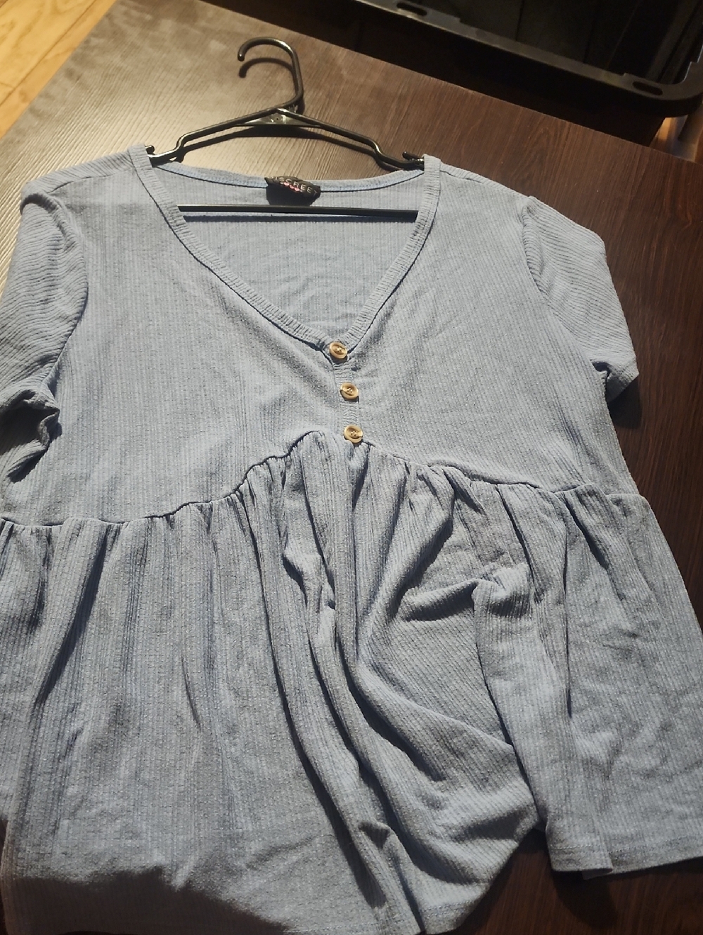 2/$5. Discreet Light Blue V-Neck Peplum Tunic with Button Accents